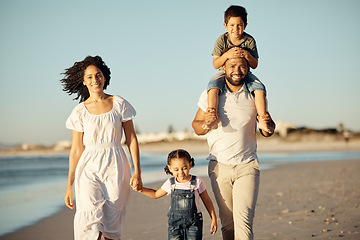 Image showing Happy, beach and walking with family at sunset on holiday for love, summer and travel together. Smile, nature and sunshine with portrait of parents and children on Miami Florida vacation by the sea
