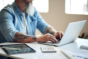 Image showing Businessman, tattoo and digital marketing laptop with startup company finance, budget or office paper data. Ceo hands, leadership or thinking manager working on technology with brand growth documents