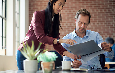 Image showing Asian business woman consulting boss with planning, schedule or financial review for company growth. Motivation, collaboration and teamwork with strategy documents, vision and mission goal.