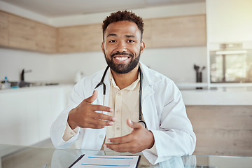 Image showing Happy medical doctor on video call, home desk in online healthcare and portrait of black man smile in digital consultation. Physician on virtual telehealth appointment, tech service and talking pov
