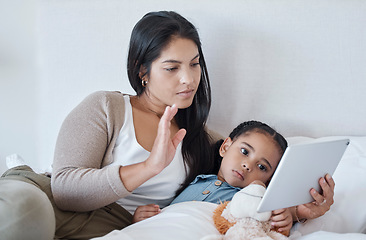 Image showing Mother and sick child, video call and with tablet for telehealth online consultation for daughter lying in bed. Serious woman and kid in bedroom greeting with 5g network communication for healthcare