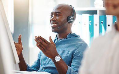 Image showing Customer service, consultant and contact us for our call center employees to support in helping you with a loan. African Fintech insurance agent working at a computer desk happy to give you advice