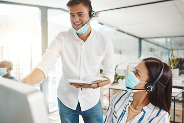 Image showing Covid, customer support and web help mentor help an office online phone consultant. Happy internet call center employee and team lead working on digital tech consulting and telemarketing training