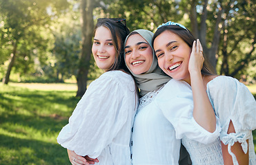 Image showing Friends, diversity and freedom with women in park and hug together for support, culture and happy summer. Community, party and spring with portrait of young girl in nature for smile, trust and peace