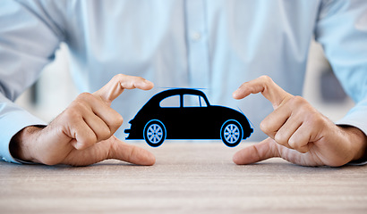 Image showing Man with model car in hands, promote business of insurance or vehicle finance at table in office. Businessman show toy auto, to advertise sale or motor repair workshop on desk at work or home