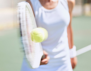 Image showing Fitness, tennis and a woman hitting ball with racket or bat on outdoor court with blur movement. Health, wellness and fun with girl on tennis court. Workout, racquet and energy for personal trainer