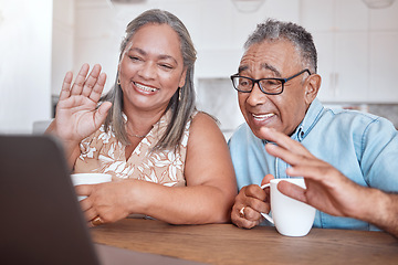 Image showing Laptop, video call and senior couple wave at friends and family while drinking coffee together at a table. Lockdown, communication and elderly man and woman enjoy online conversation in their home