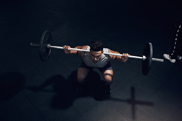 Image showing Barbell squat, dark gym and man sports training, workout and fitness of heavy weightlifting in health club. Above of indian bodybuilder, athlete and body exercise, muscle power and strong motivation