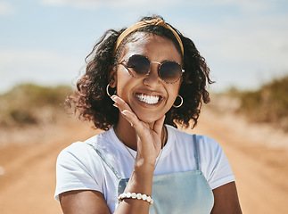 Image showing Happy, smile and black woman on a travel road trip break in the summer sunshine in nature. Portrait of a person from Texas face with happiness and vacation fun outdoor in the sun feeling freedom