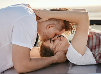 Image showing Kiss, love and couple with a man and woman on a real date or road trip for holiday, romance or travel together. Vacation, relationship and natural with a young male and female dating in nature