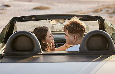 Image showing Car, travel and couple together on a road trip stop by a beach to spend quality time. Holiday transport break of a girlfriend and boyfriend smile with love, happiness and vacation gratitude outdoor
