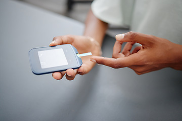 Image showing Diabetes, digital and blood sugar test with hands of black woman check with glucometer for healthcare, analysis and insulin levels. Results, wellness and medical device with finger of patient