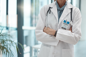 Image showing Woman, doctor and arms crossed medical healthcare worker in hospital, wellness and research consulting clinic. Trust, medicine and surgery insurance employee with stethoscope in trauma help workplace