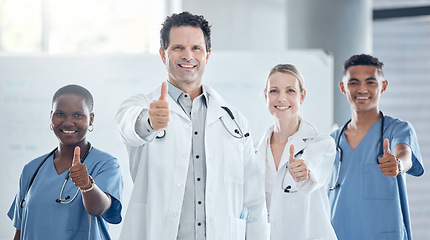 Image showing Thumbs up, doctor and happy nurse staff together with success, thank you and welcome hand sign. Portrait of healthcare, medical and health clinic staff smile with a yes, winner and agreement gesture