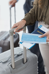 Image showing Travel, covid and compliance closeup of woman at the airport with passport and luggage, traveling for business during pandemic. Safety, corona and rules in lockdown by female getting ready to board