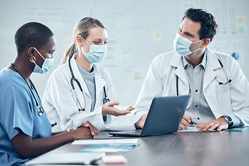 Image showing Covid, doctors and team with laptop working together on medical, medicine or covid 19 vaccine research. Collaboration, diversity or hospital group of people or healthcare worker team work on analysis