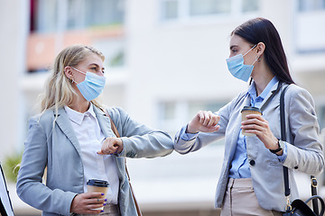 Image showing Covid, healthcare and elbow greeting with business people in the morning for social distancing, communication and contact. Partnership, friends and new handshake with women working in global pandemic