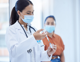 Image showing Covid vaccine, healthcare and doctor consulting with a patient at a hospital. Nurse, medical employee and worker helping a woman with safety from virus with medicine and liquid with face mask