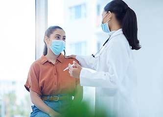 Image showing Covid, health and patient vaccine of a doctor consulting a woman in a hospital or clinic office. Healthcare consultant and employee working and helping with medicine and medical advice for dengue