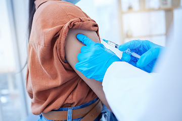 Image showing Doctor, hands and covid vaccine in clinic for virus safety and immunity in healthcare pandemic. Professional medical worker giving patient coronavirus injection for serious illness immunization.