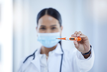 Image showing Covid, health thermometer check and doctor woman mask of a hospital worker. Portrait of a hospital, medical clinic and healthcare employee from Spain help with dengue nursing and fever monitoring