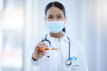 Image showing Thermometer, covid and doctor with digital results of fever while working in a hospital. Portrait of a nurse, medical worker and surgeon with reading from tech for safety from virus with a face mask