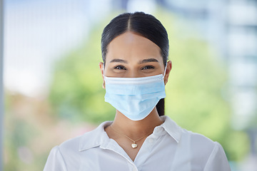 Image showing Happy business woman, covid face mask for workplace and portrait of corporate professional in pandemic. Healthcare virus company policy for office safety, employee satisfaction and hygiene protection