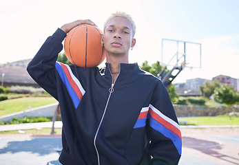 Image showing Basketball, portrait and man on sports court ready for training, game or competition with serious expression. Workout, athlete and male from Brazil playing ball sport for exercise, fitness and health