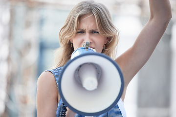 Image showing Protest, angry and woman talking with megaphone at a riot in the city of Iran. Face portrait of young girl making noise with an announcement on microphone while speaking about womens rights