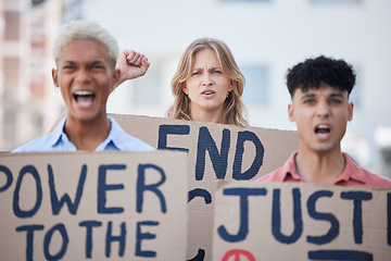 Image showing Angry, activism and activist group protest racism, oppression and human rights violation with poster. Diverse students, fist and rally together for unity and civil rights, justice and revolution.