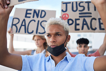 Image showing Man, crowd and protest for peace, racism and justice in street with poster in hands. People, sign and writing on cardboard for solidarity, freedom and diversity of race and human rights