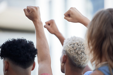 Image showing Crowd fist hands, protest rally event and community justice, government corruption and politics of freedom, empowerment and human rights equality. People fighting revolution together to change future