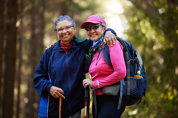 Image showing Hiking, nature and happy senior women trekking on travel for fun adventure, fitness journey or retirement lifestyle. Portrait smile of elderly friends walking for health workout in India forest woods