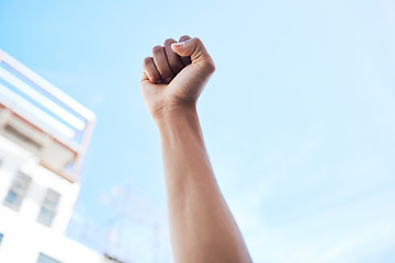 Image showing Fist hands, in air for protest rally and justice with solidarity with Iran woman movement for freedom, human rights or empowerment. People fight climate change, call for action and corrupt politics.