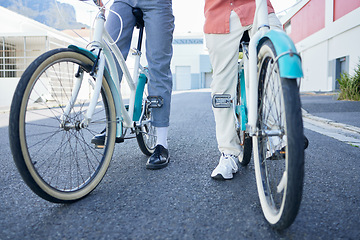 Image showing Bicycle, city and couple legs for street exercise or travel in an urban town together for an outdoor adventure. Cycle wheels for tour of people or cycling tourists on a bike in a town in South Africa