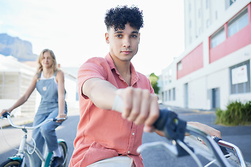 Image showing Bike, travel and friends with a man and woman riding a bicycle together in the city during summer. Sport, cycling and carbon footprint with a young male and female friend biking in an urban town