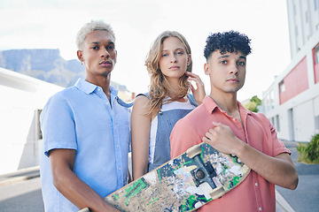 Image showing Friends, urban skate and diversity of people holding a skateboard outdoor together. Portrait of a city skating, gen z sports group ready to exercise a ride technique on a road for training and fun