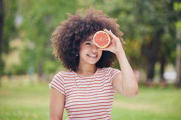 Image showing Nature, smile and happy black woman with grapefruit for beauty or healthy body on outdoor day in garden park. Wellness, freedom and relax nutritionist girl with fruit, food or organic health product