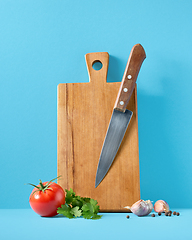 Image showing wooden cutting board and knife