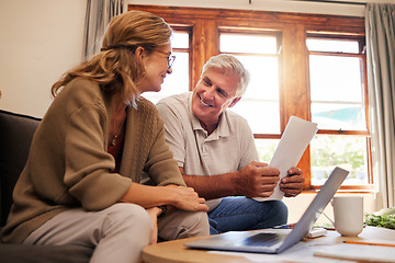 Image showing Laptop, senior couple and retirement planning with documents while sitting on sofa in the living room. Finance, budget and happy elderly man and woman working on pension fund, mortgage bills and debt