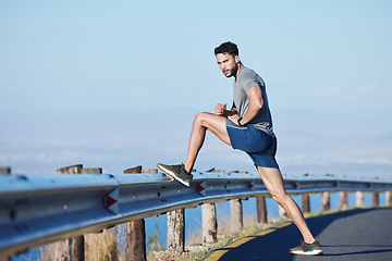 Image showing Health, man athlete and stretching outdoor for wellness, fitness and dedicated workout. Healthy male, relax trainer in sportswear or being focus, doing warm up or strong cardio for training exercise.