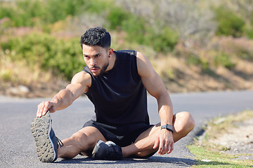 Image showing Runner, stretching and motivation for fitness, exercise and training on nature, park or sustainability environment road. Man, sports athlete and personal trainer ready for marathon running or workout