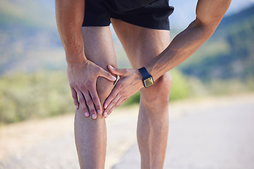 Image showing Running, knee and injury with a sports man suffering from pain during a workout, exercise or training for fitness. Runner, health and medical with a male athlete holding a sore joint in inflammation