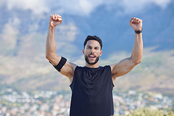 Image showing Fitness, winner and yes with a sports man in celebration of a victory outdoor in nature in the mountains. Exercise, training and workout with a young male athlete celebrating his target or goal