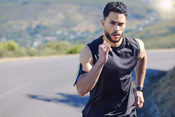 Image showing Training, fitness and man running on road with endurance, energy and strength. Male doing workout, run and exercise for marathon in the city. Motivation, inspiration and determination in sports