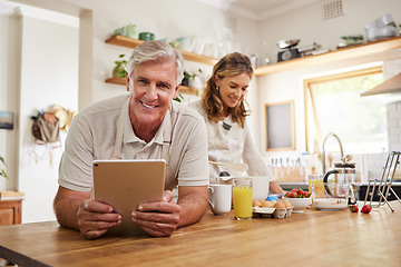 Image showing Portrait, senior couple and cooking with tablet together in a modern kitchen of the home. Happy, retirement and elderly man and woman baking with ingredients, recipe and instructions on mobile device