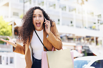 Image showing Phone, wow and shopping with a black woman customer looking surprised while in an outdoor city mall. Retail, sale and deal with a young female on a mobile call talking about a store discount