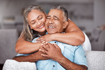 Image showing Happy senior couple, hug and relax in love for relationship bonding together in tender happiness at home. Joyful elderly man and woman smile in hope embracing romance for retirement house on sofa