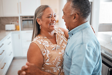 Image showing Senior couple dance in kitchen with celebration for retirement, real estate or happy marriage. Elderly pension people dancing to music with love, care and wellness in their house or home together