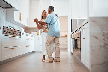 Image showing Couple, elderly and dance in kitchen for love, romance and happy together while home in retirement. Senior, man and woman do fun dancing in house for bonding, happiness and care with smile on face